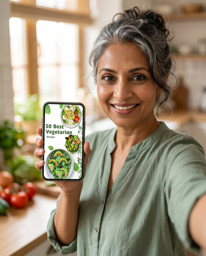 Woman holding phone displaying 50 Vegetarian Recipes ebook